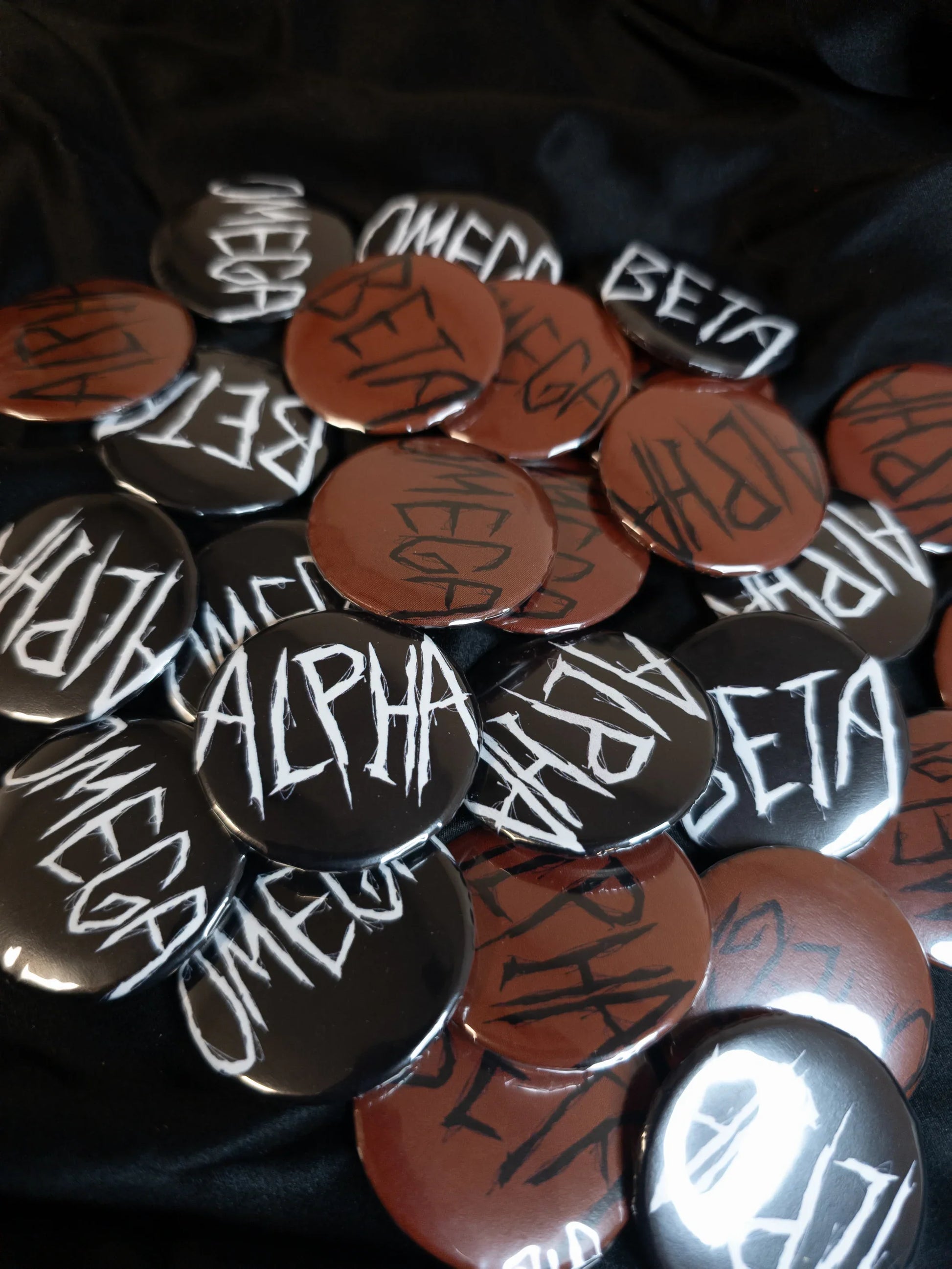 image of a pile of black and red buttons