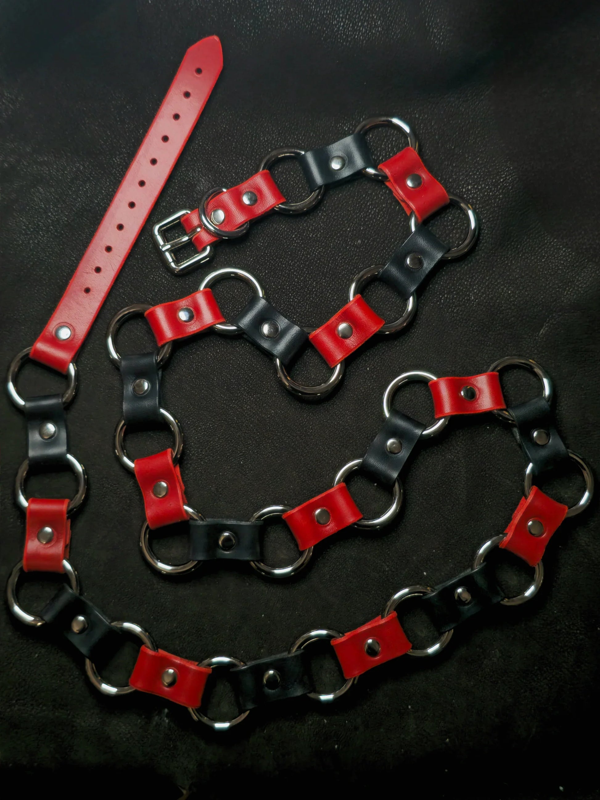 red and black belt on brown background