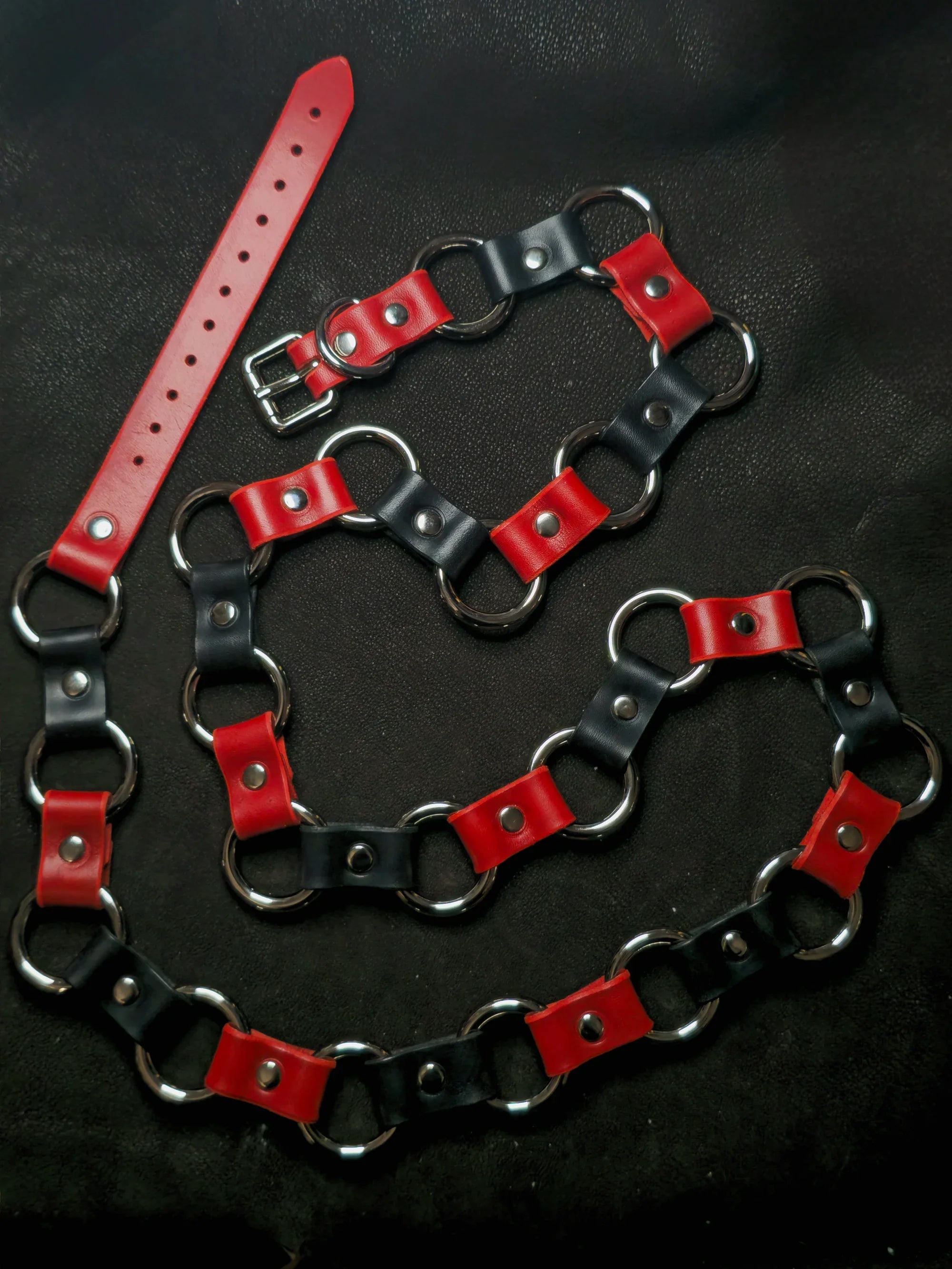 red and black belt on brown background