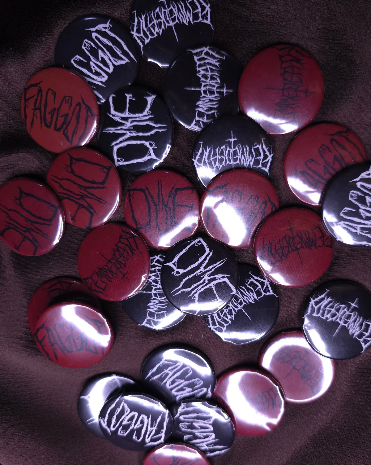 Collection of buttons with text on a brown surface
