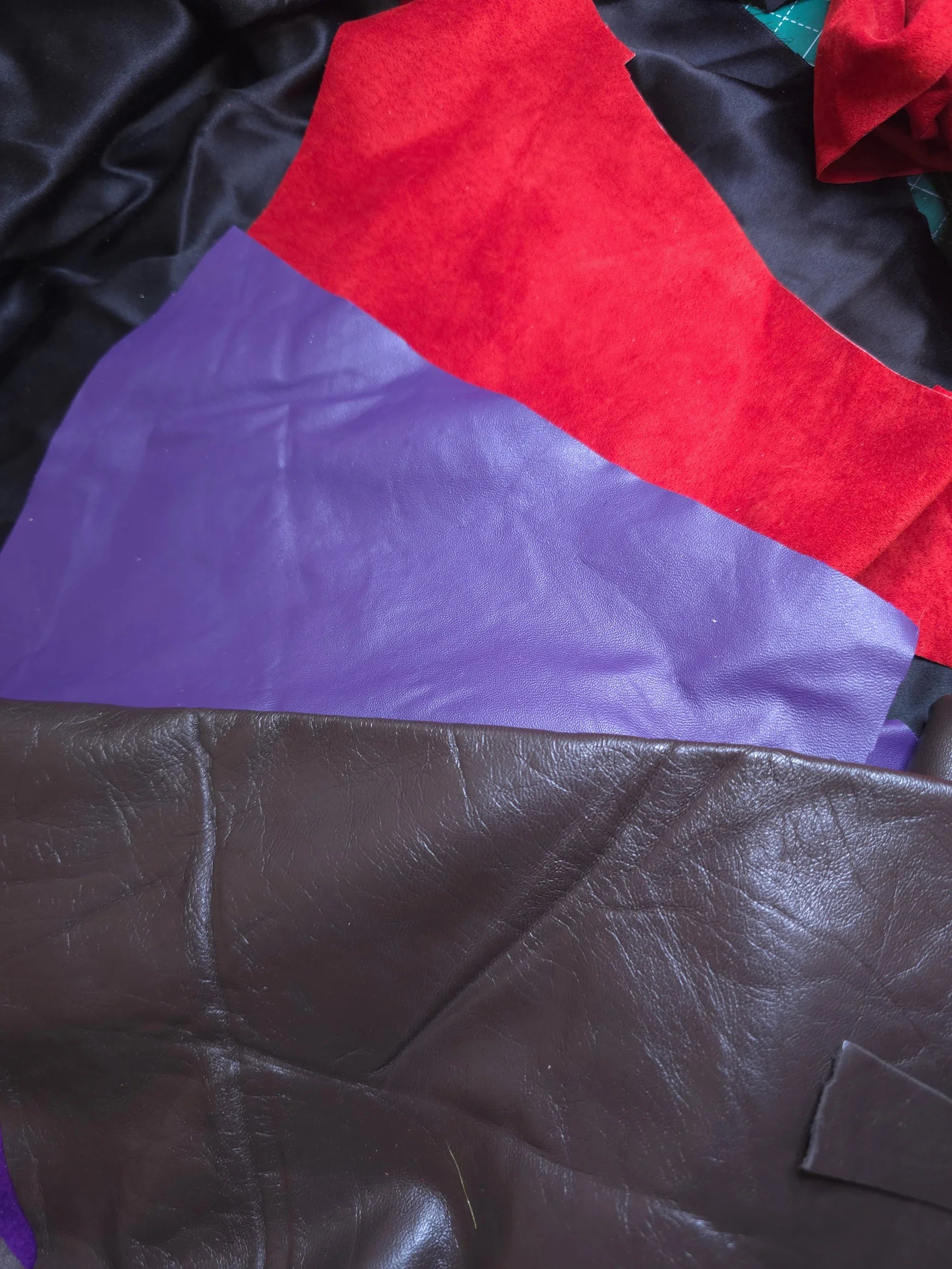 image of red purple and brown leather