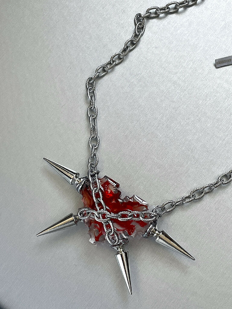 Bleeding cyber heart necklace