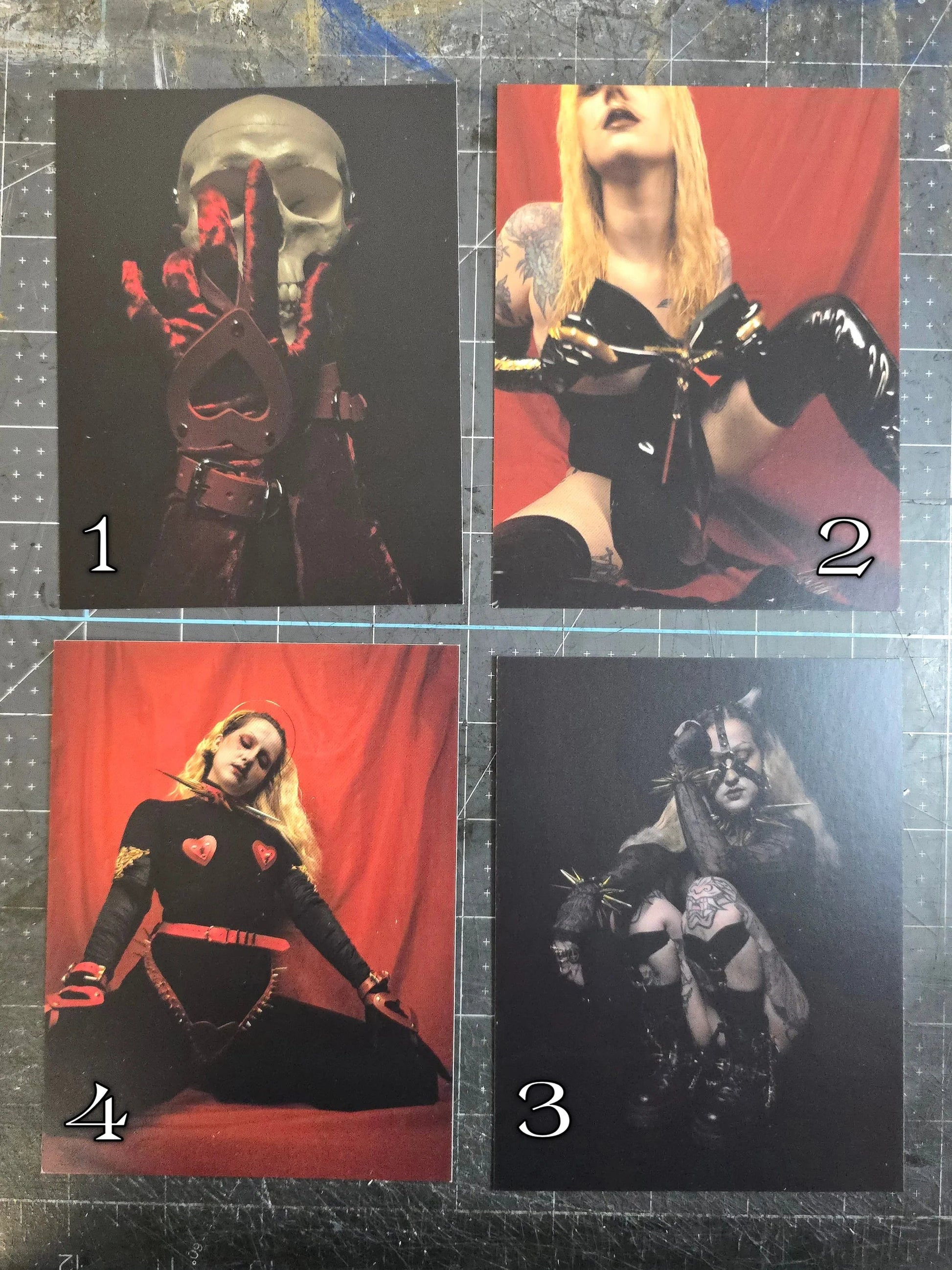 four post cards with portraits labeled with numbers