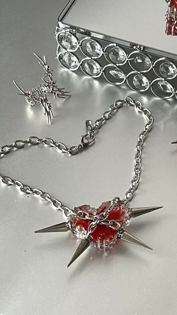 Bleeding cyber heart necklace