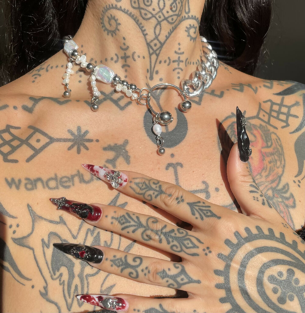 Pierced pearls necklace