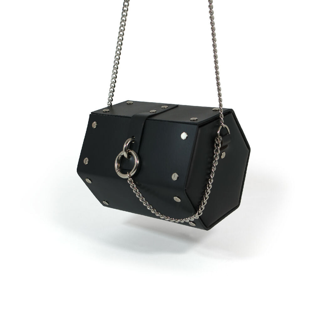 black leather handbag with chains