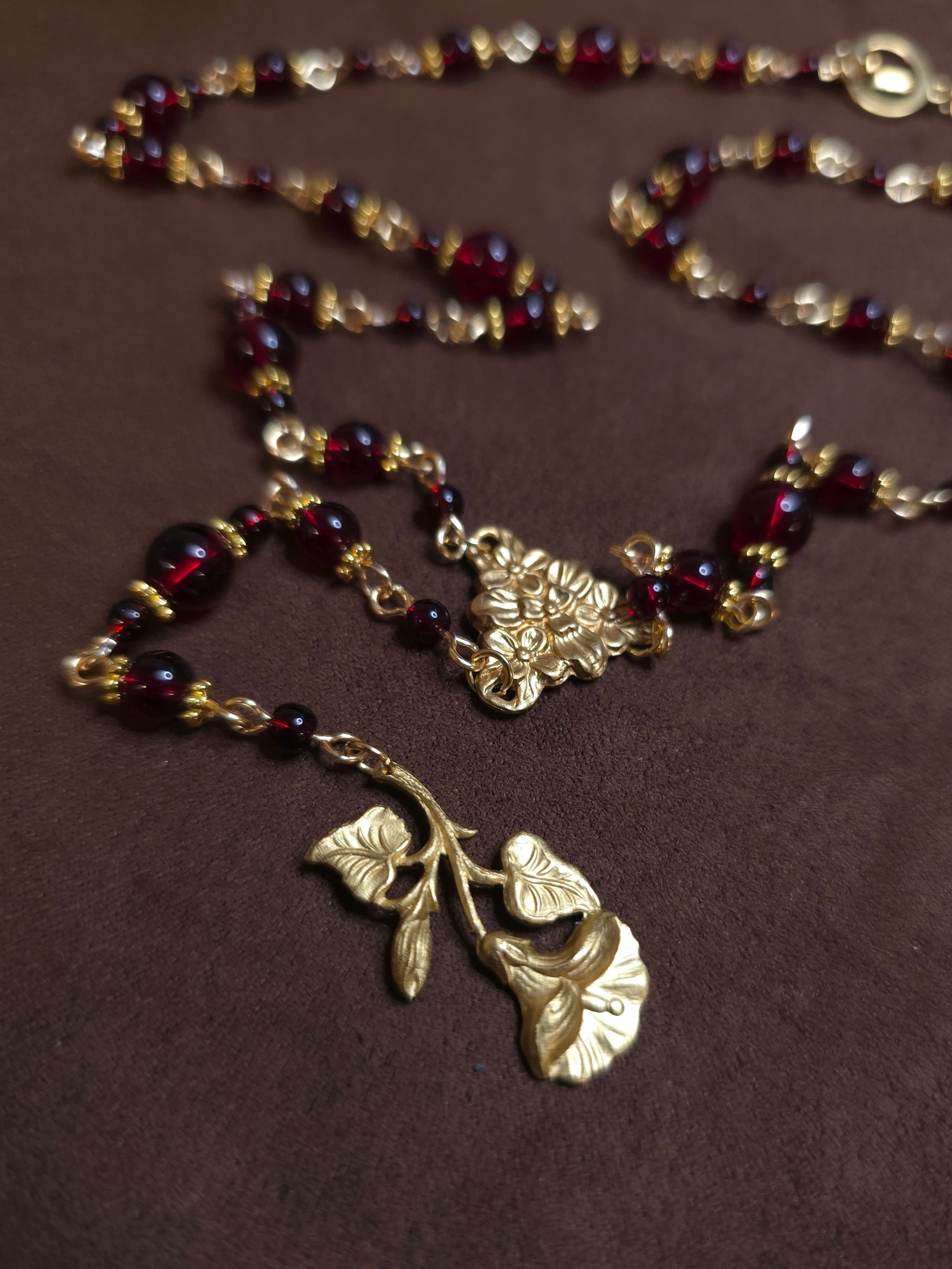 Red beads ang golden flower charm rosary