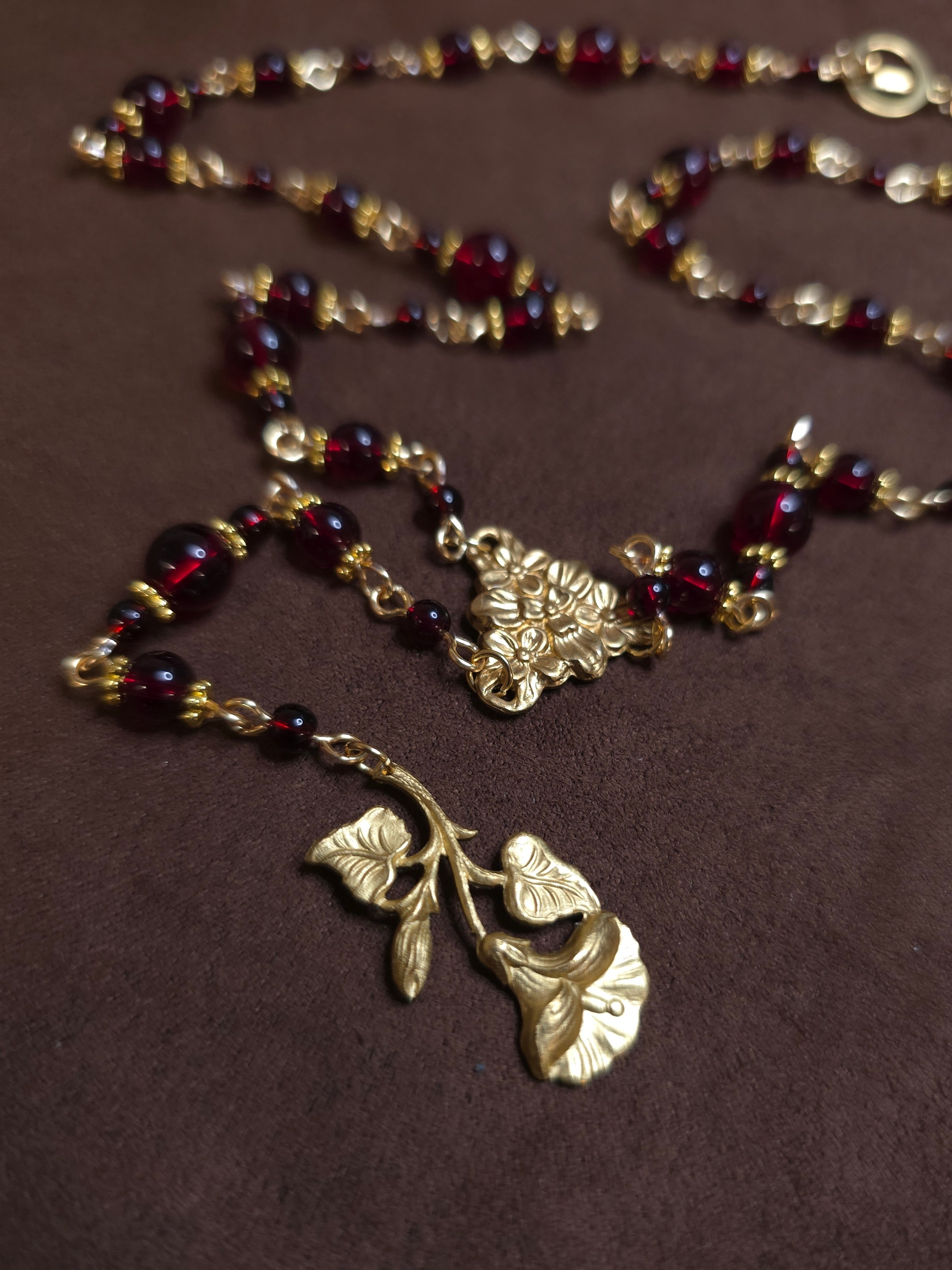 Red beads ang golden flower charm rosary