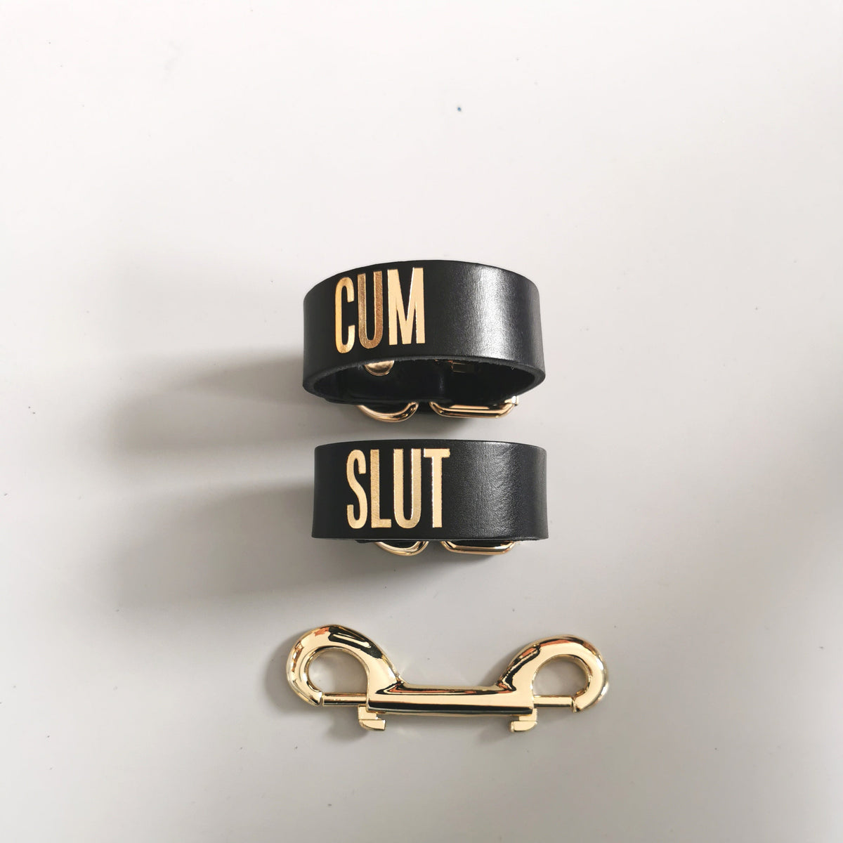 Leather Handcuffs “Cum Slut”
