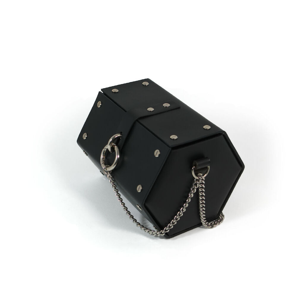 black leather handbag with chains