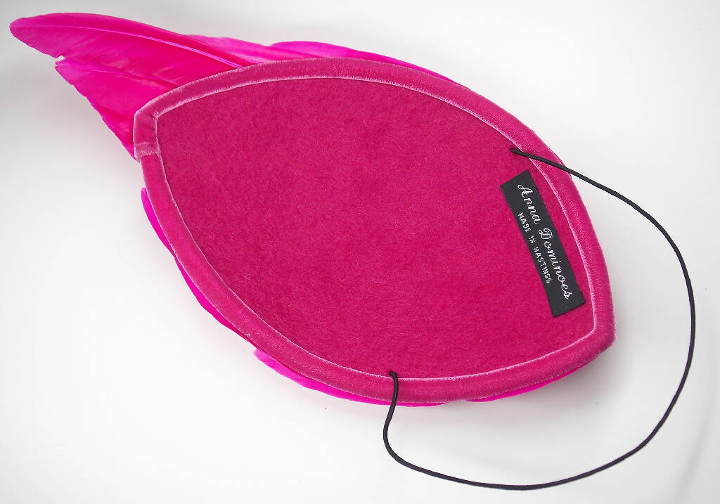 Hot pink feather wing fascinator