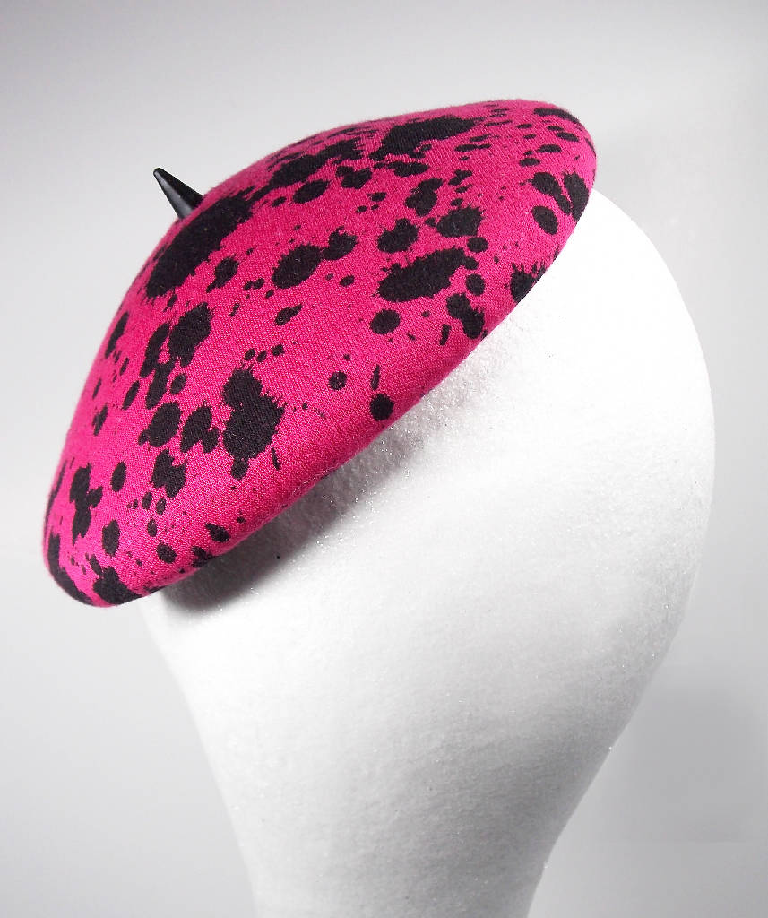 Pink mini hat with splatter design and spike