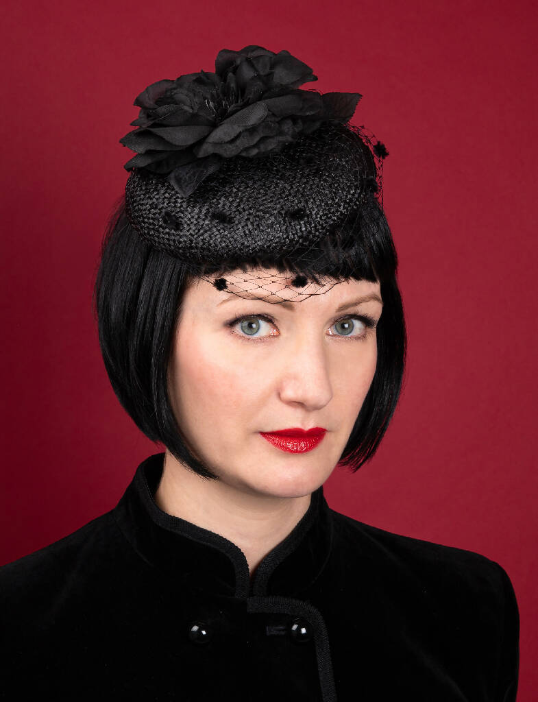 Small black hat with flower and veil