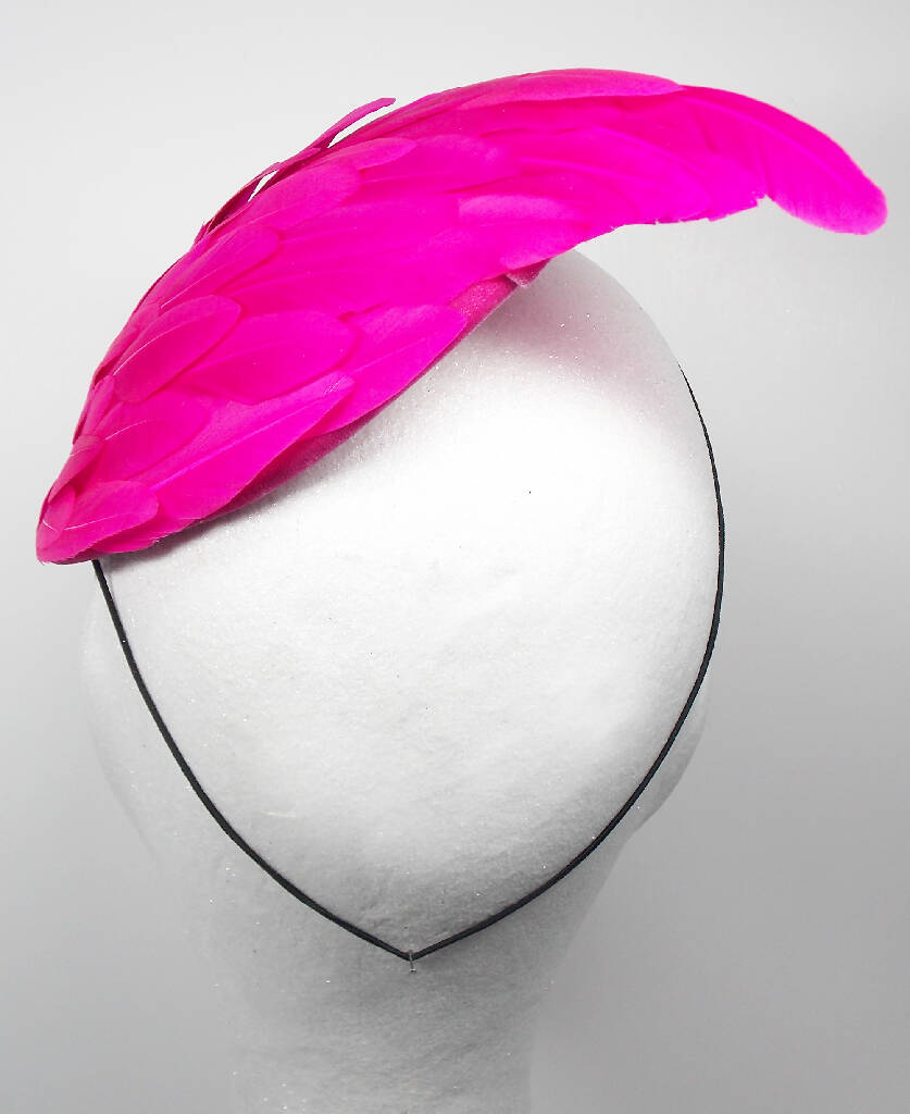 Hot pink feather wing fascinator