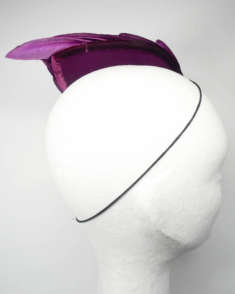 Purple feather wing fascinator
