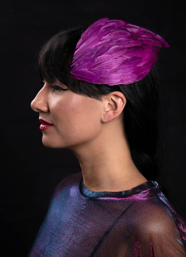 Purple feather wing fascinator