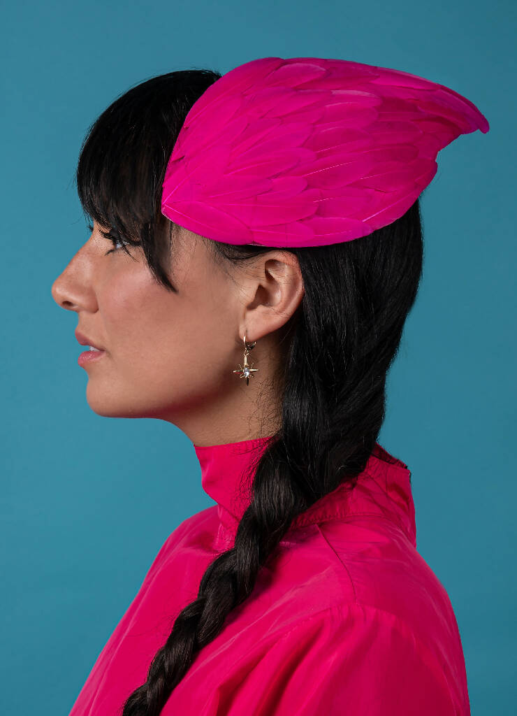 Hot pink feather wing fascinator