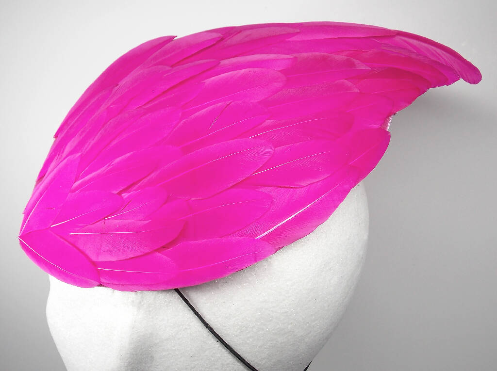 Hot pink feather wing fascinator
