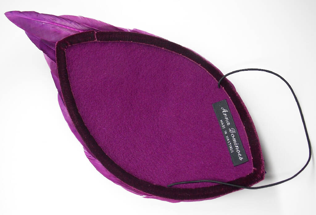 Purple feather wing fascinator