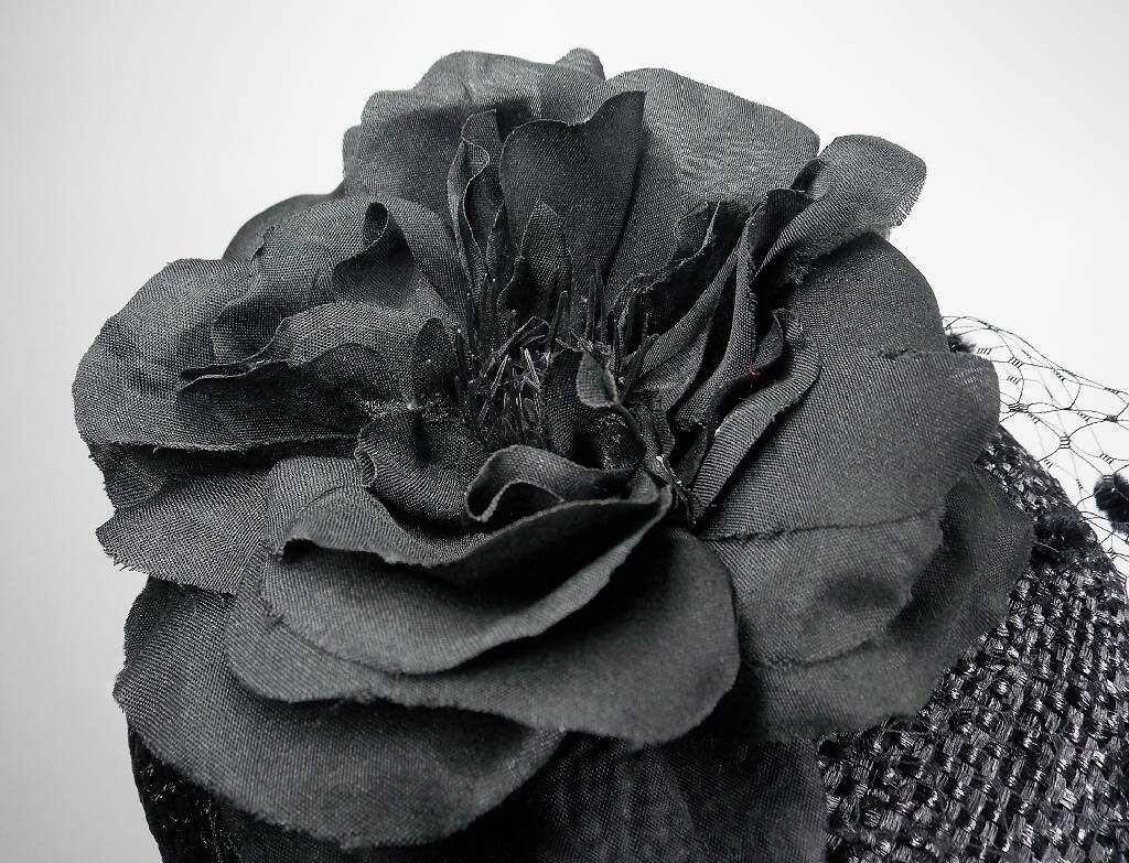 Small black hat with flower and veil