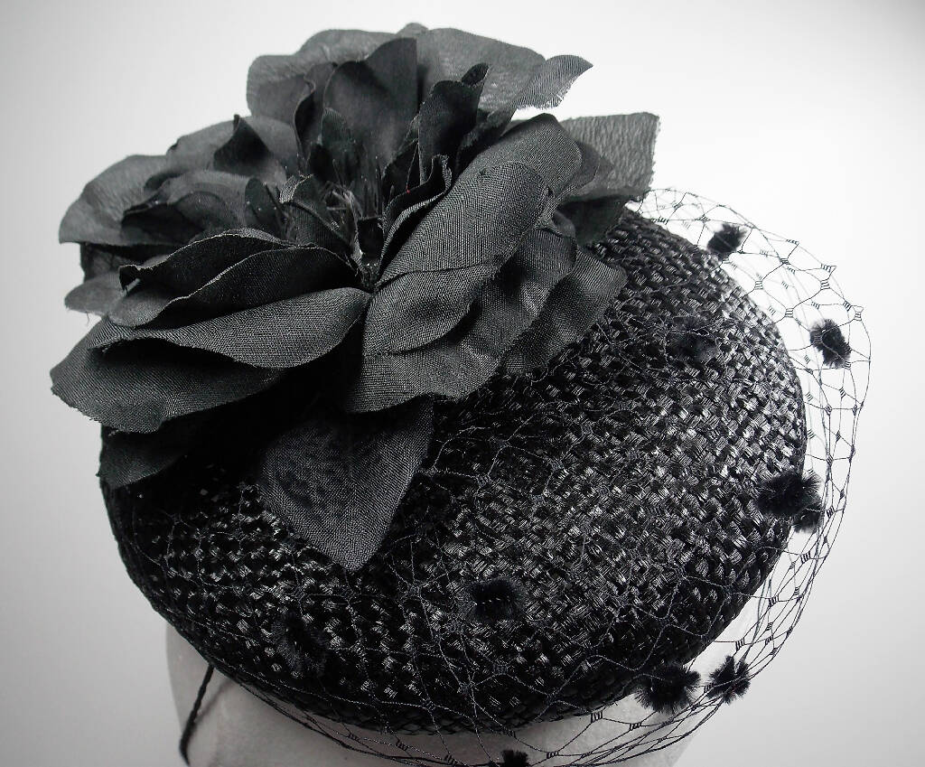 Small black hat with flower and veil