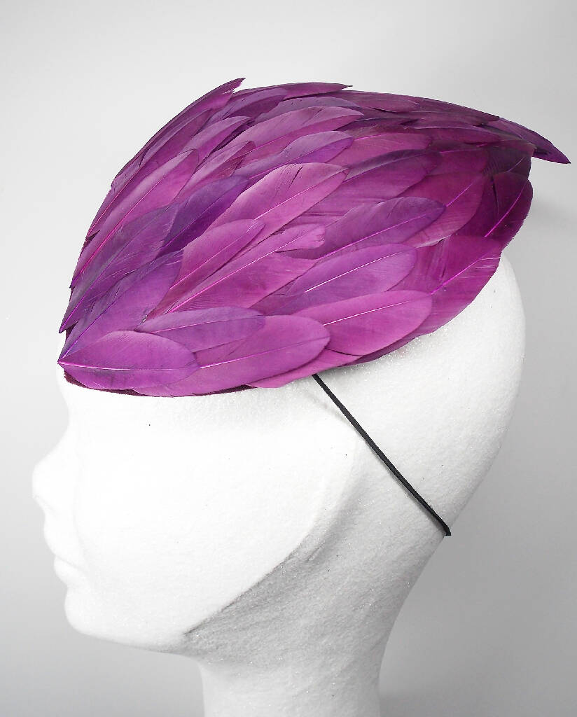 Purple feather wing fascinator