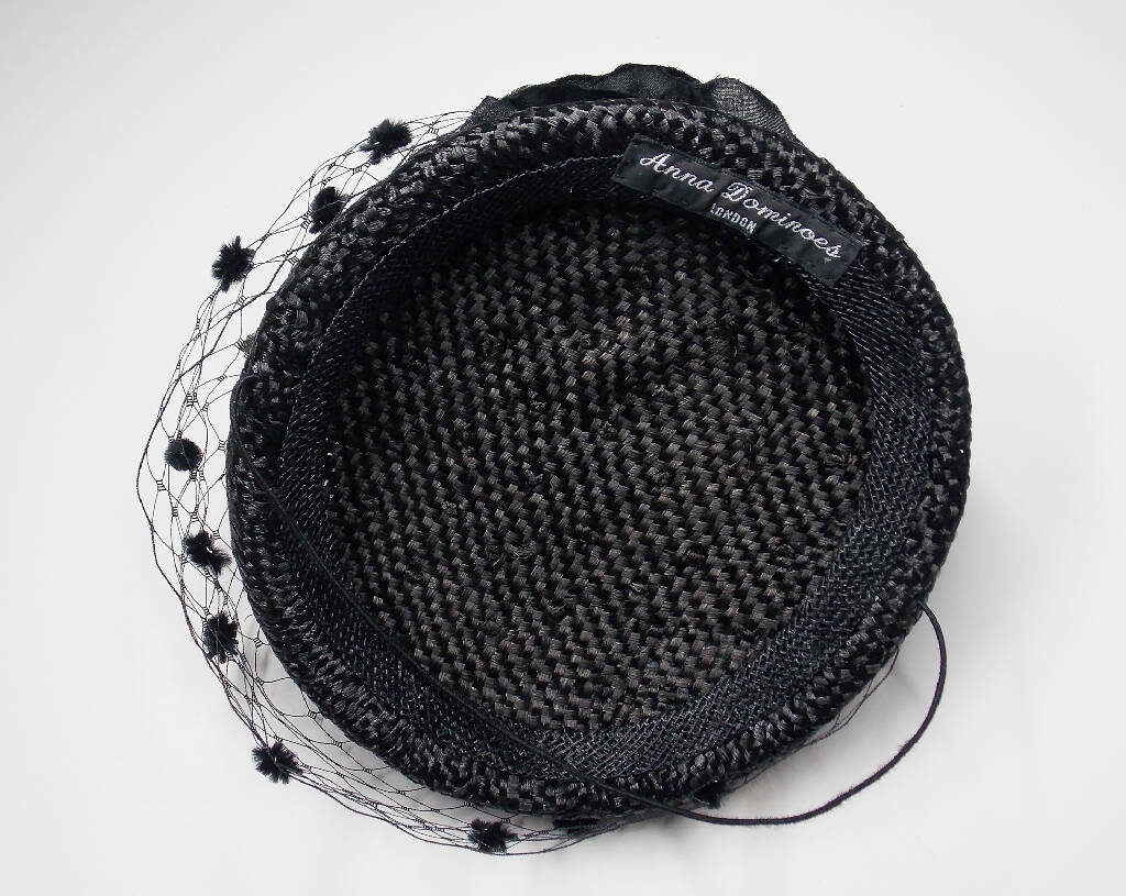 Small black hat with flower and veil