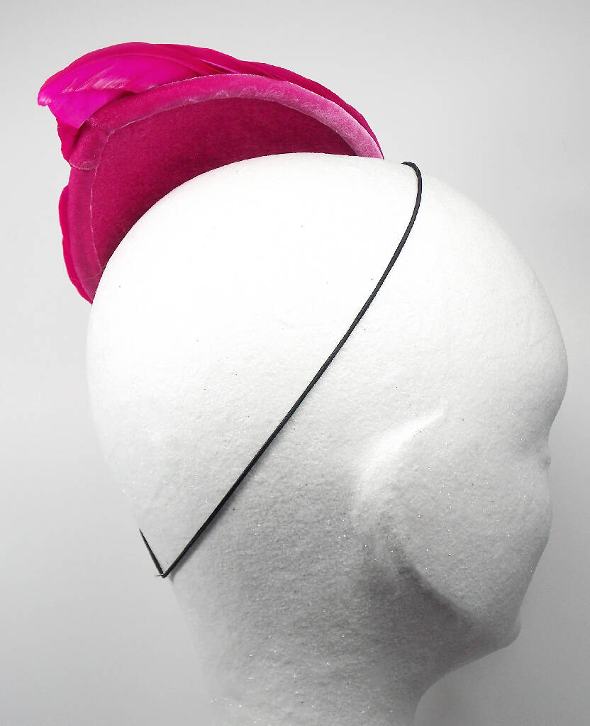 Hot pink feather wing fascinator