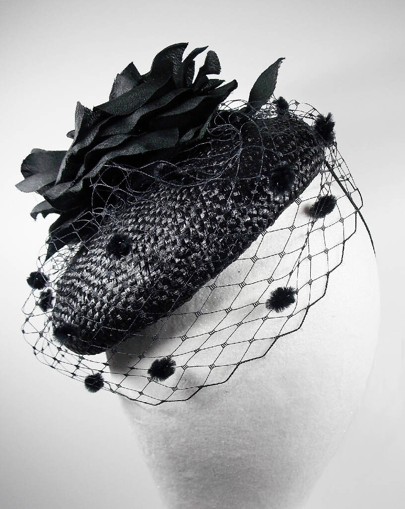 Small black hat with flower and veil